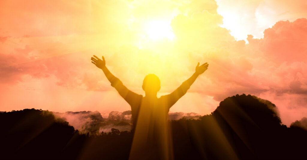 9688-man-praising-at-sunrise-sunburst-nature-faith
